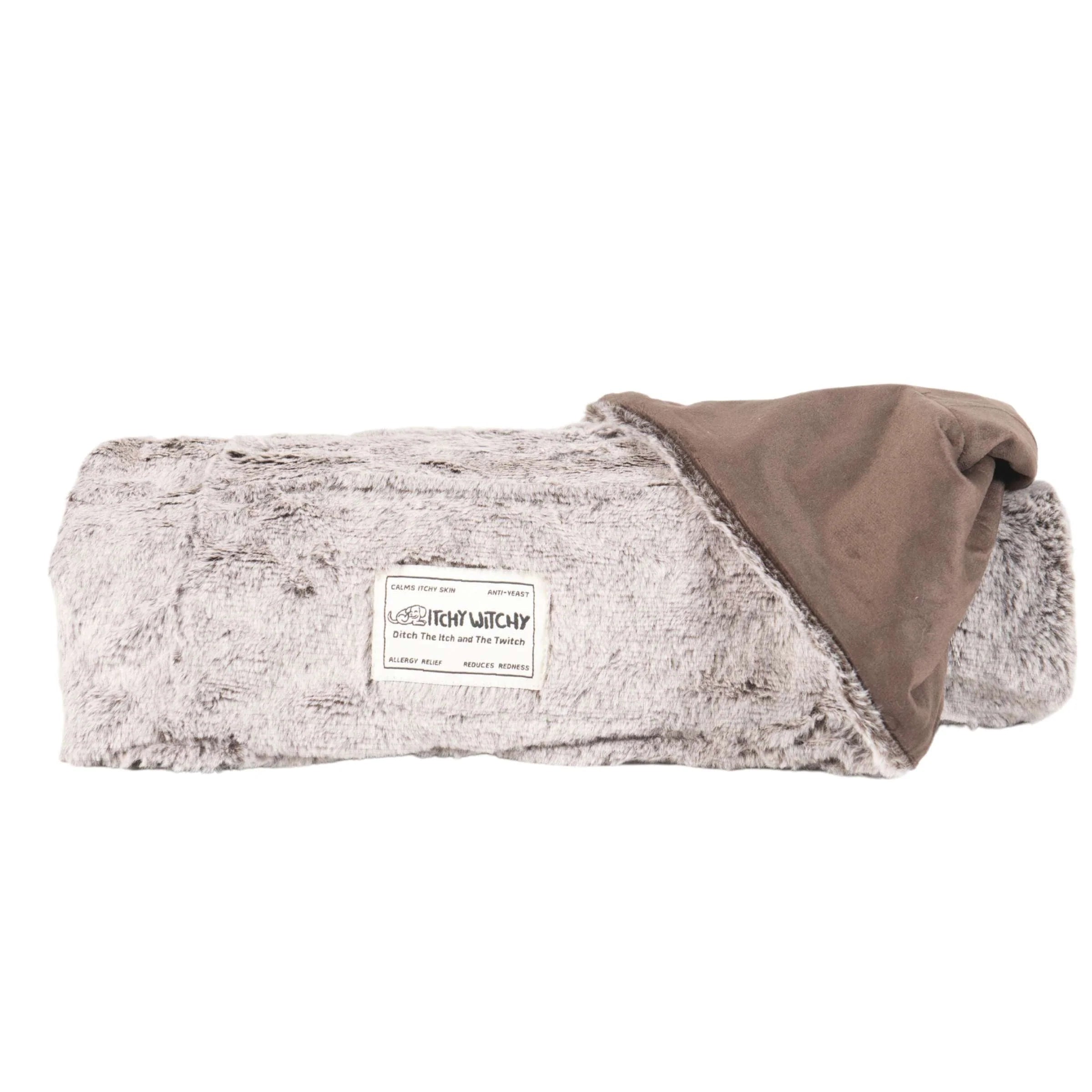 Your dog is about to experience ultimate comfort with a breakthrough blend of old school natural apothecary and a high-tech delivery device in a soft and cozy blanket. The Itchy Witchy blanket features a soft, plush, and silky faux fur texture that is gentle and inviting to dogs. Blanket is a natural, non-toxic, and drug-free way to soothe your dog's itchy skin.